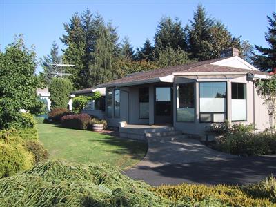 An image of a beautiful house.Contact People's Real Estate Inc Property Management can provide property management for properties like this.